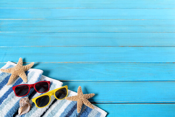 Summer beach background border, sunglasses, starfish, wood decki