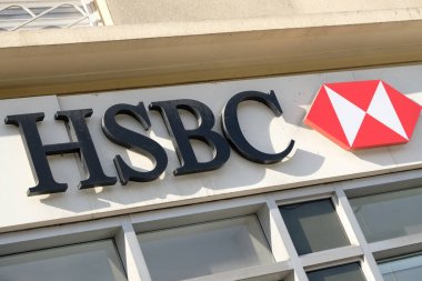 Cannes, France - October 25, 2017 : close up of HSBC bank entrance sign and logo clipart