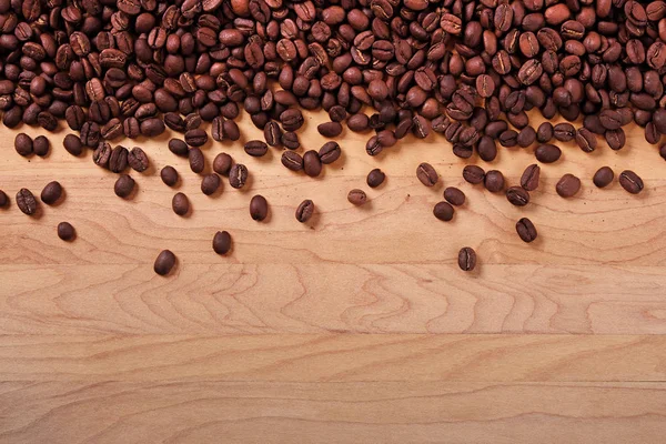 Coffee beans wood background border