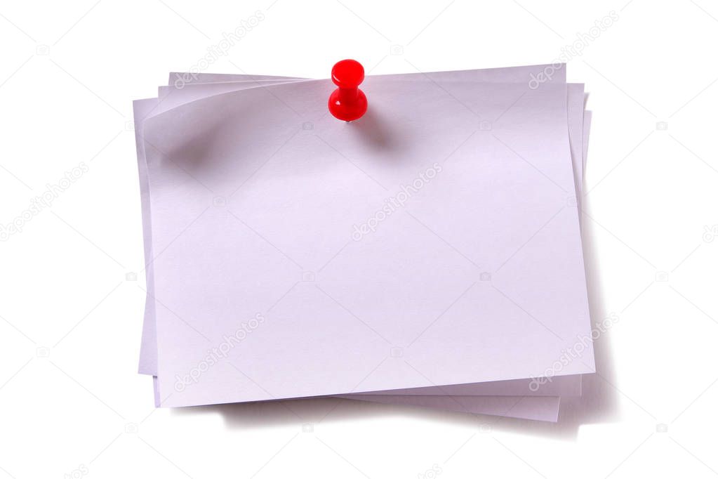 Several plain white sticky post notes with red pushpin