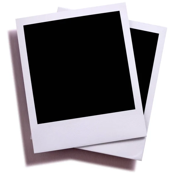 Two blank instant camera photo prints isolated on white — Stock Photo, Image