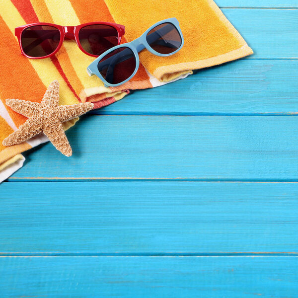 Tropical beach background, sunglasses, copy space