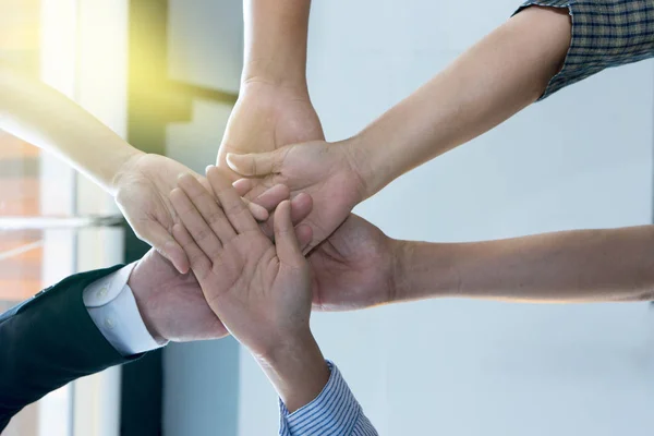 Hand together in the business office show teamwork — Stock Photo, Image