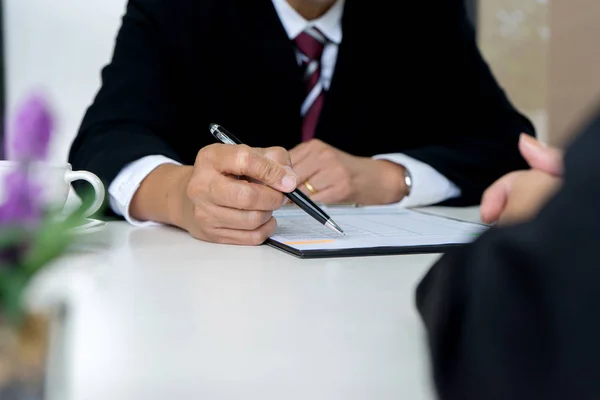 Boss sitting to a new work who just pass — Stock Photo, Image