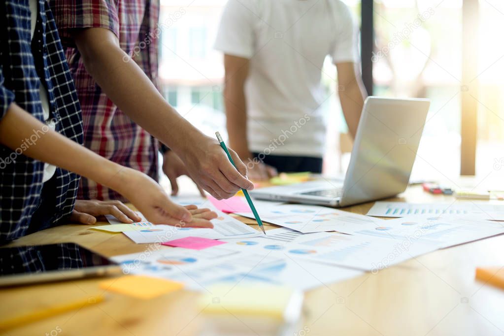 group of young business people work together teamwork 