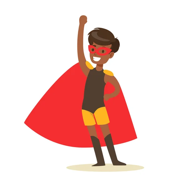 Pojke som låtsas ha superkrafter klädd i svart superhjälte kostym med röd Cape och maskera leende karaktär — Stock vektor