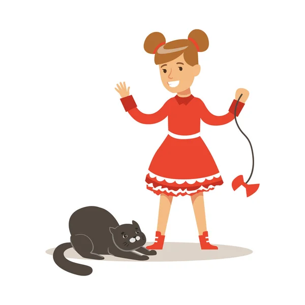 Petite fille drôle en robe rouge jouant avec chat noir. Illustration vectorielle de personnage de dessin animé coloré — Image vectorielle