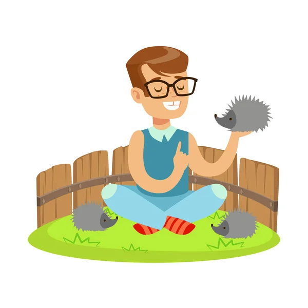 Happy little boy sitting on green grass and playing with hedgehogs in a mini zoo. Colorful cartoon character vector Illustration — Stock Vector