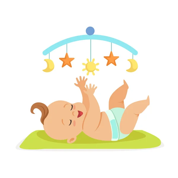 Schattige gelukkig naakte baby in een luier in bed liggen en plezier maken met speelgoed carrousel, kleurrijke cartoon karakter vector illustratie — Stockvector