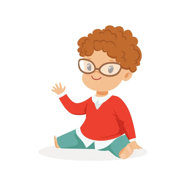 Doux petit garçon rousse souriant en vêtements décontractés assis vecteur de personnage de dessin animé coloré Illustration — Image vectorielle