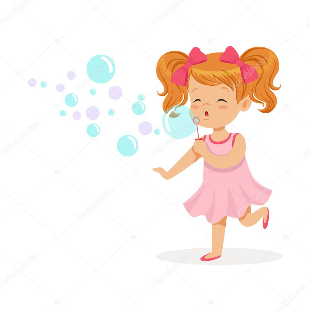 girl in pink dress blowing bubbles