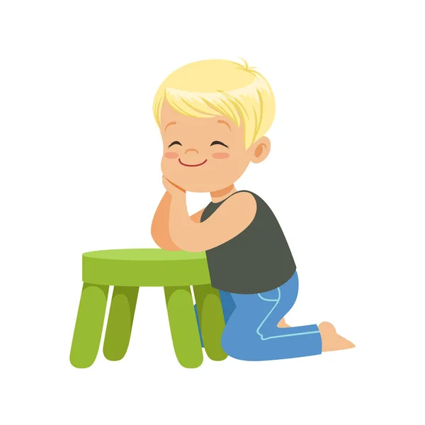 Petit garçon appuyé sur un petit tabouret vert — Image vectorielle