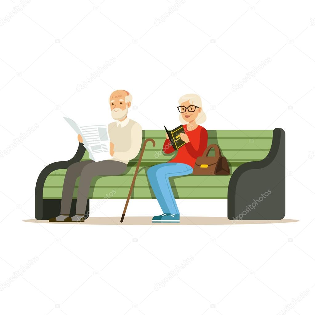 Seniors sitting on wooden bench 