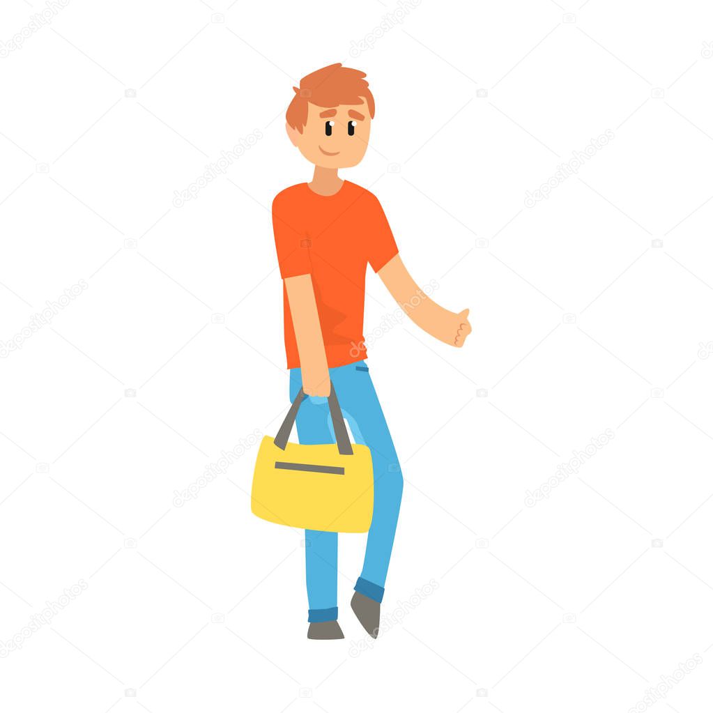 Young man with bag standing