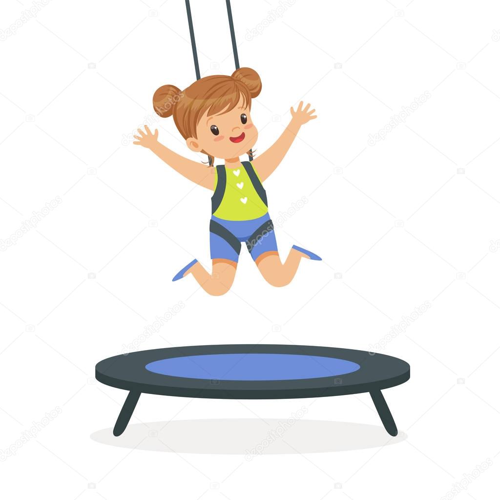 Cute girl jumping on trampoline
