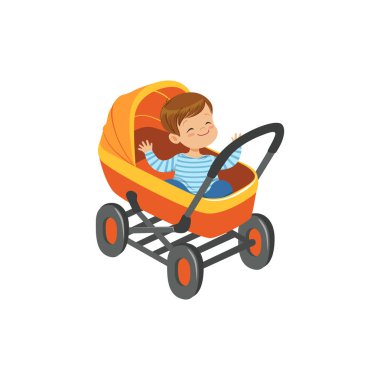 bir portakal bebek arabası içinde oturan çocuk