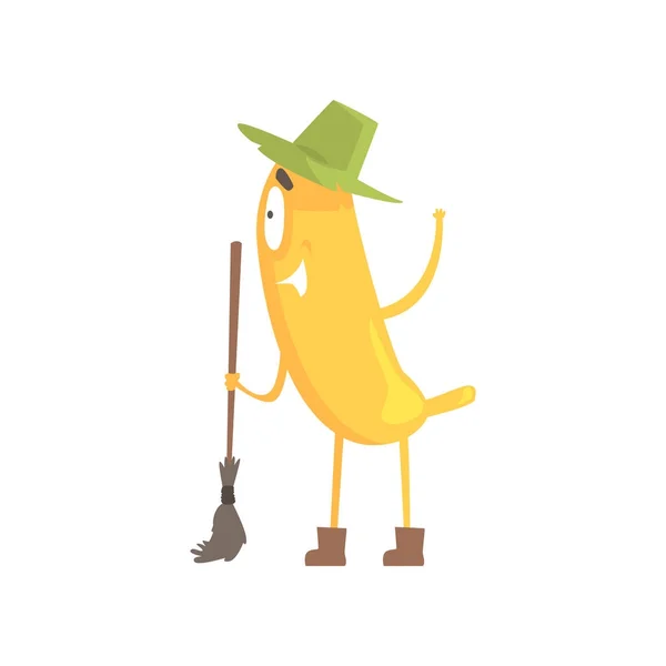 Carino divertente banana in cappello verde che tiene scopa, cartone animato divertente personaggio frutta vettore Illustrazione — Vettoriale Stock