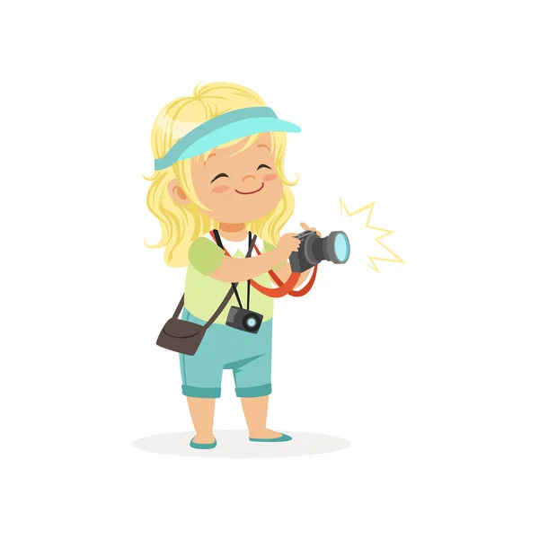 Cartoon flat preschool girl standing with digital photo camera in hands. Photographer or reporter profession concept — Stock Vector