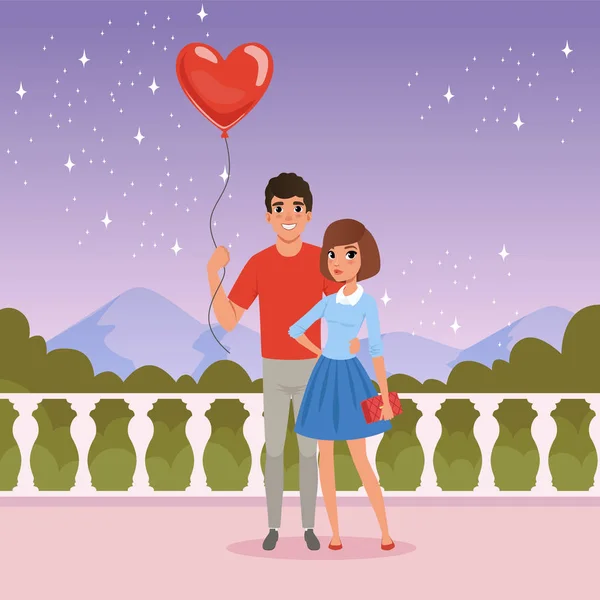 Romantic couple on the date. Man holding balloon in heart shape. Fence, starry sky, mountains and green bushes on background. Valentines Day. Cartoon flat vector design — Stock Vector
