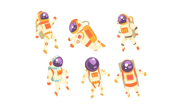 Conjunto de astronautas lindos. Ilustración vectorial sobre fondo blanco . — Vector de stock