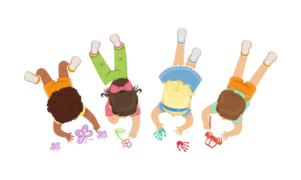 Cute Little Kids Lying on the Floor Drawing Pictures Vector Illustration — 图库矢量图片