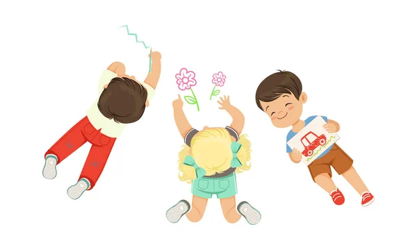 Cute Little Kids Lying on the Floor Drawing Pictures Vector Illustration — 图库矢量图片