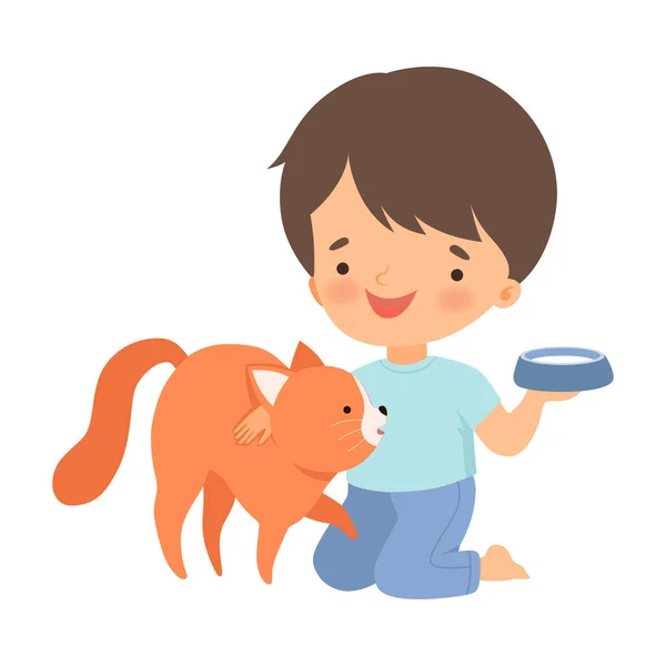 Little Boy Stroking Cat and Putting Down the Bowl of Milk Vector Illustration — 스톡 벡터