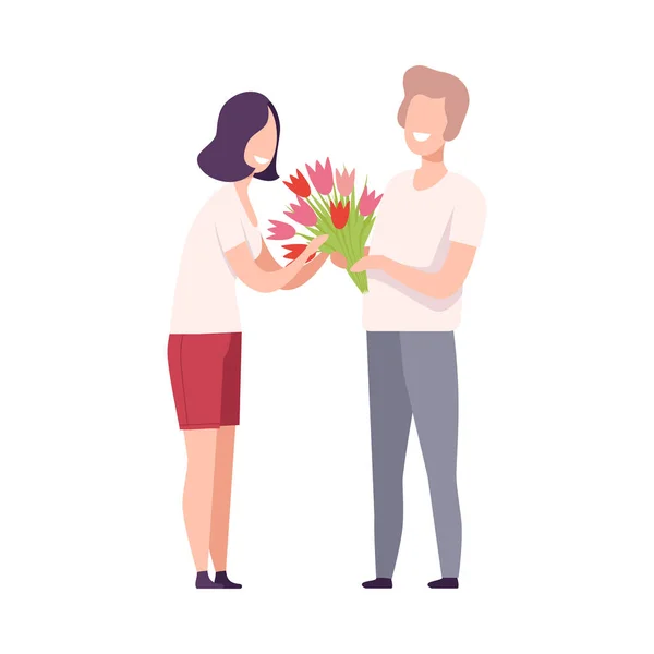 Man geeft boeket bloemen aan mooie Brunette vrouw, romantisch paar in liefde op datum, vakantie, platte vector illustratie — Stockvector