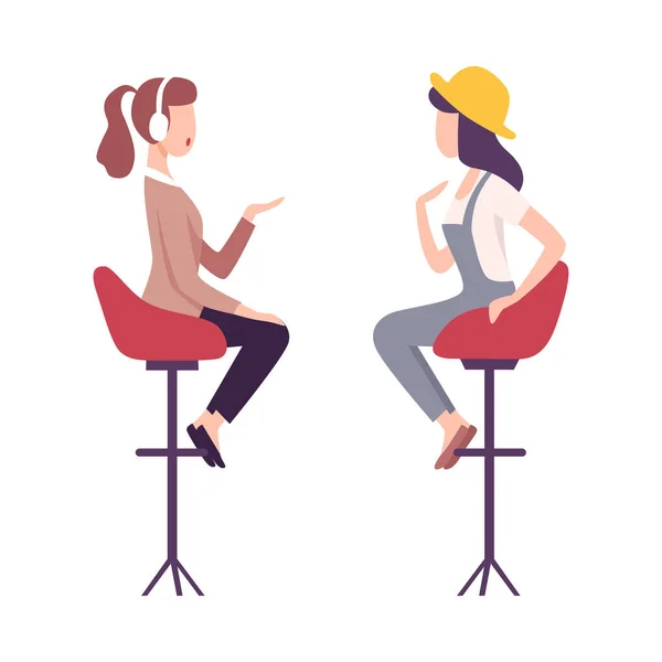 Journalist in Headphones Interviewing Female Celebrity, Two Young Woman Sitting on High Chairs and Talking to Each Other Flat Vector Illustration — Stock Vector
