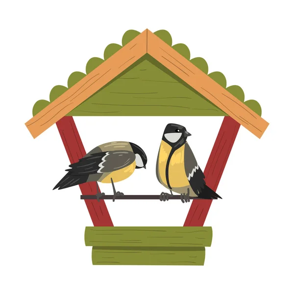 Χειμώνας Bird Τροφοδότης με τιμούζες, Βόρεια Πουλιά σίτιση από σπόρους σε ξύλινο τροφοδότη Διάνυσμα Εικονογράφηση — Διανυσματικό Αρχείο