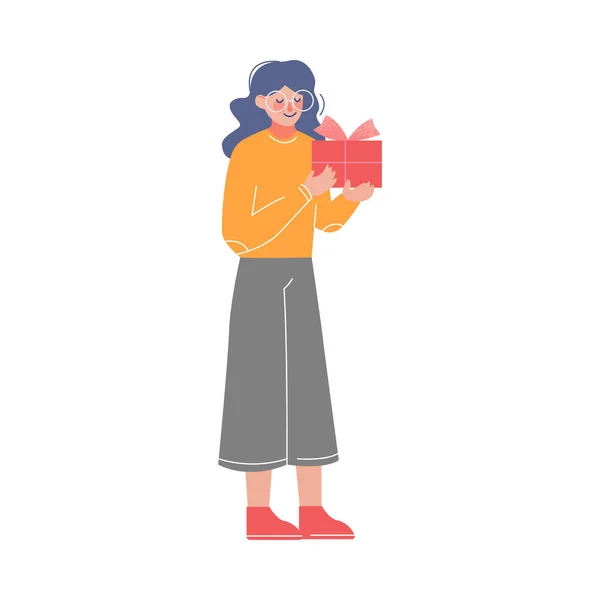 Dívka stojící s dárkové krabice zdobené červenou stuhou luk, dospívající dívka slaví narozeniny, Vánoce nebo Nový rok dovolená karikatura vektorové ilustrace — Stockový vektor