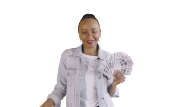 Satisfied happy excited african american woman showing money and dancing on camera on white background Jean jacket — Stock Video