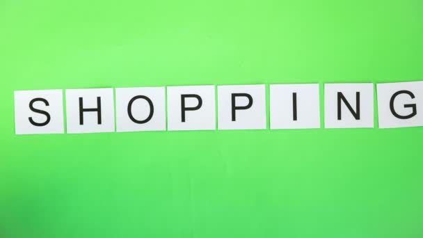 Cartes avec lettres sur écran vert. Timelapse. Mot SHOPPING — Video