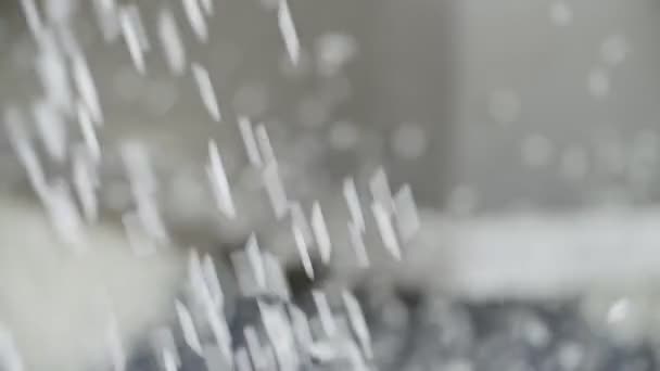 Slow motion of falling frozen rice on factory — Stock Video