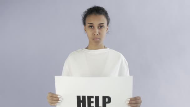 Afro-American Girl Activist With HELP Poster on grey background — Stock Video