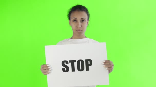 Afro-American Girl Activist With Stop Poster on chroma key backage — ストック動画