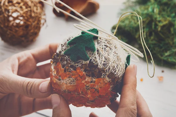 Creative diy hobby. Handmade craft christmas decoration, balls and garland — Stock Photo, Image