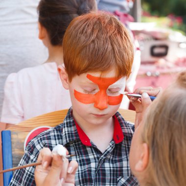 Çocuk çocuk yüz boyama, Kaplan gözü işlem yapma