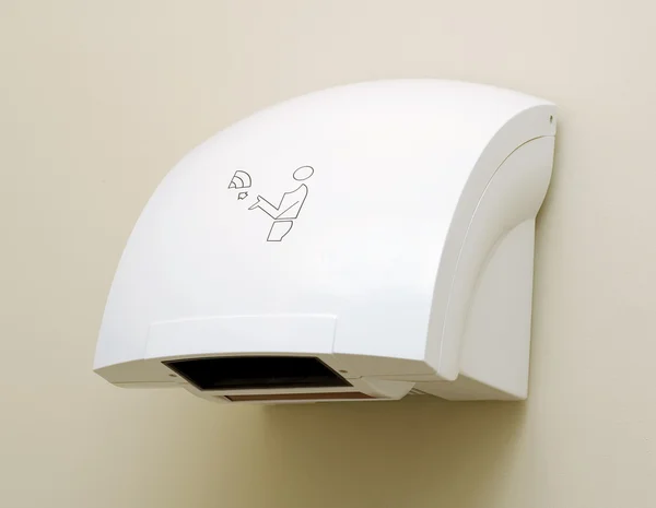 Secador automático de mão em wc público — Fotografia de Stock