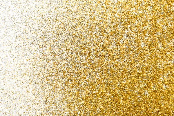 Golden glitter sand texture on white, abstract background. — Stock Photo, Image