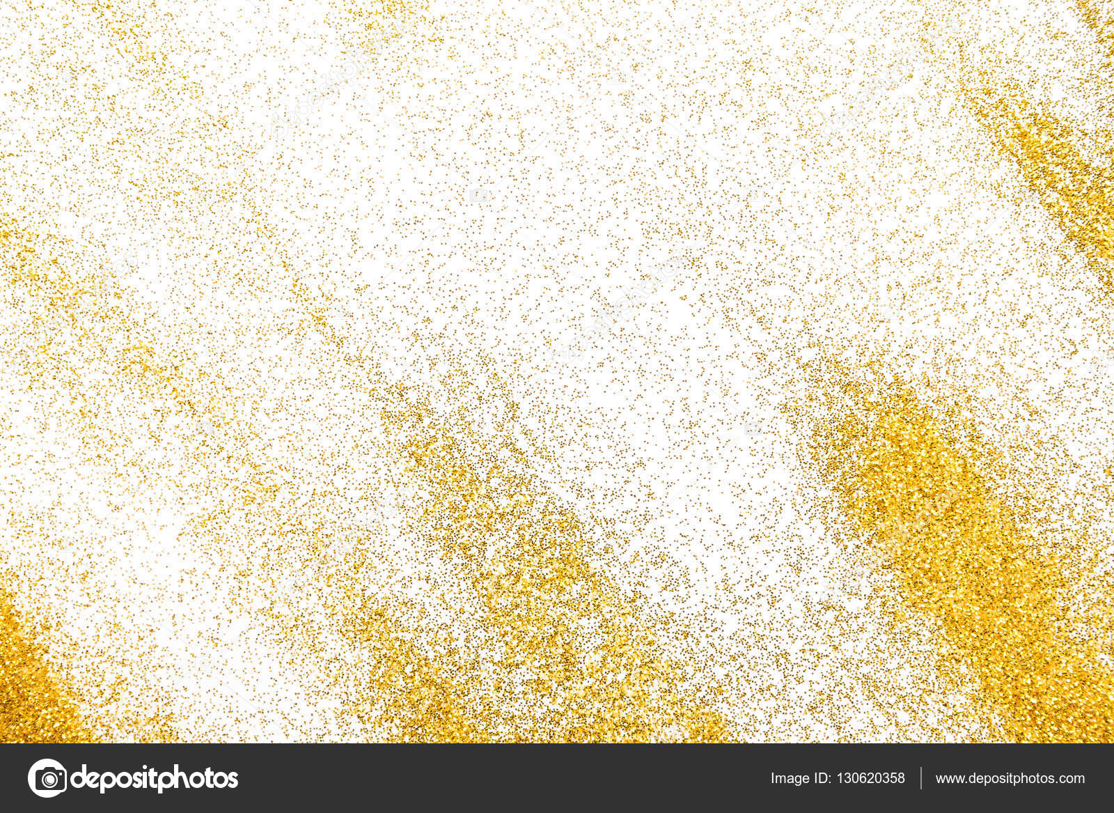 Golden glitter sand texture on white, abstract background. Stock Photo