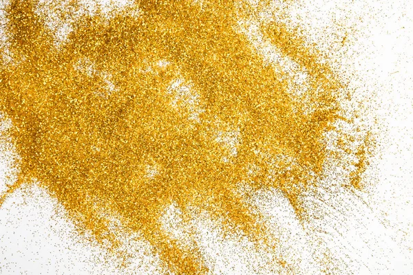 Golden glitter sand texture on white, abstract background. — Stock Photo, Image