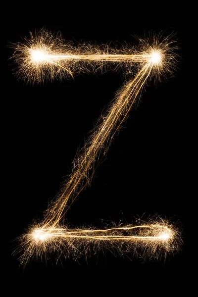 Engelska bokstaven Z från tomtebloss alfabetet på svart bakgrund. — Stockfoto