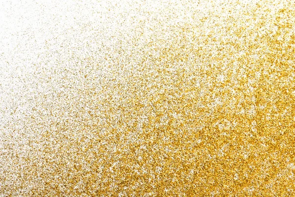 Texture sable doré pailleté sur fond blanc abstrait . — Photo