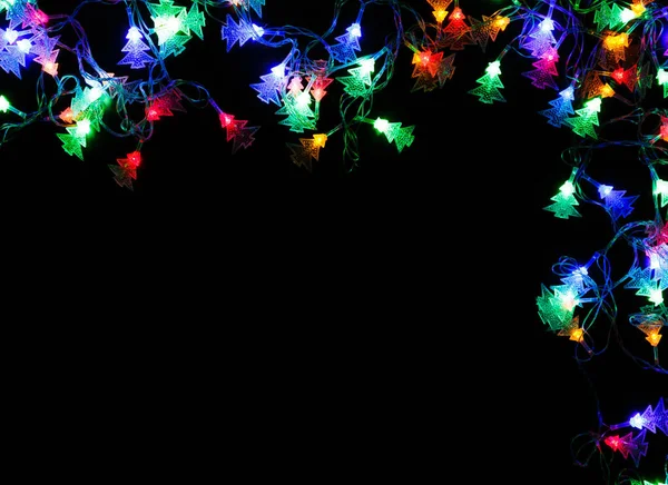 Noël lumières bordure sur fond noir — Photo