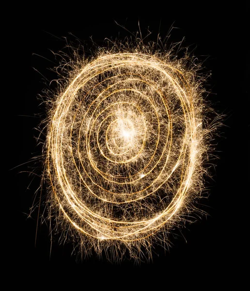 Nowy rok party brylant koło spirala zbliżenie na czarnym tle — Zdjęcie stockowe