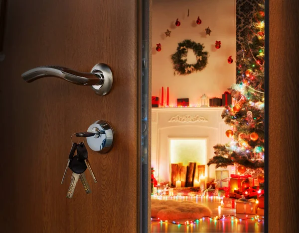 Opening door in christmas room, welcome to holiday
