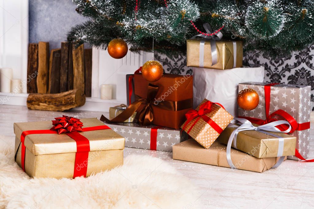 Christmas presents under fir tree, holiday concept