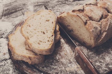 Fırın kavramı arka plan. Bıçak kesim ekmek ekmek dilimleri