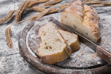 Fırın kavramı arka plan. Bıçak kesim ekmek ekmek dilimleri